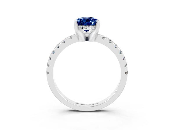 Silver Pear Cut Blue Sapphire Solitaire Ring with Round Pavé Band and Four-Prong Setting
