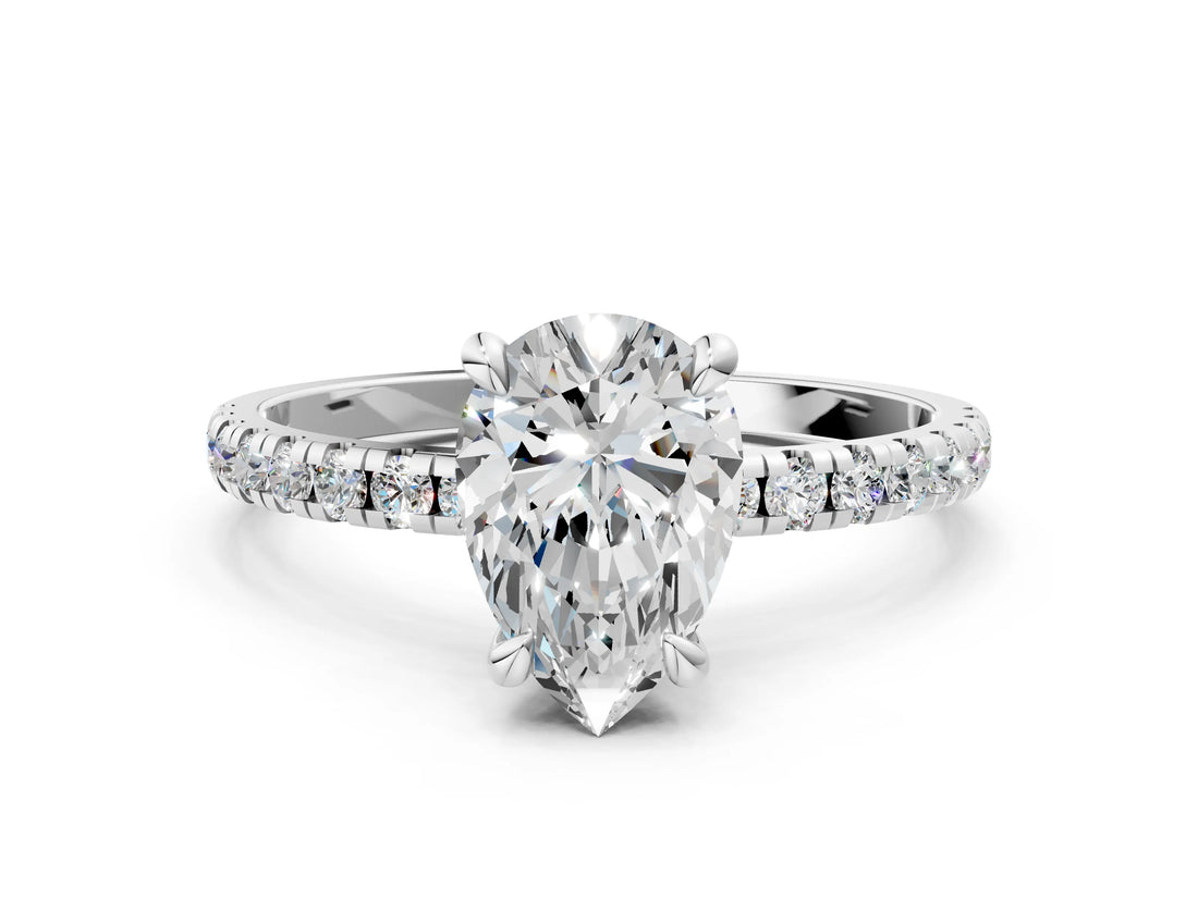 Silver Pear Cut Diamond Brilliant Solitaire Ring with Pavé Band and Four-Prong Setting_17