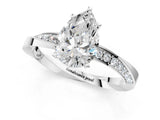 Silver Pear Cut Diamond Engagement Ring with Side Stone Accents and Four-Prong Setting_22
