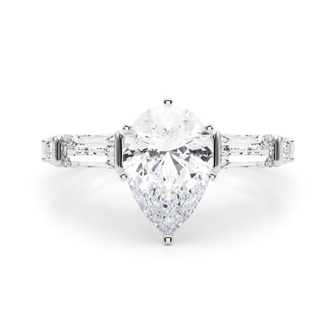 Silver Pear Cut Diamond Ring with Baguette Side Stones, Channel Set Band, and Four-Prong Setting