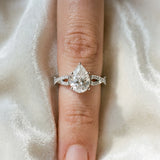 Silver Pear Cut Diamond Solitaire Engagement Ring with Twisted Pavé Band and Four-Prong Setting_78