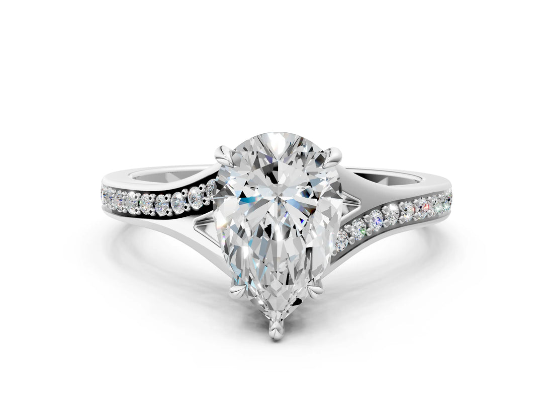 Silver Pear Cut Diamond Solitaire Ring with Pavé Band and Prong Setting_28