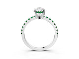 Silver Pear Cut Diamond Solitaire Ring with Round with Emerald side stone Pavé Band and Four-Prong Setting_15