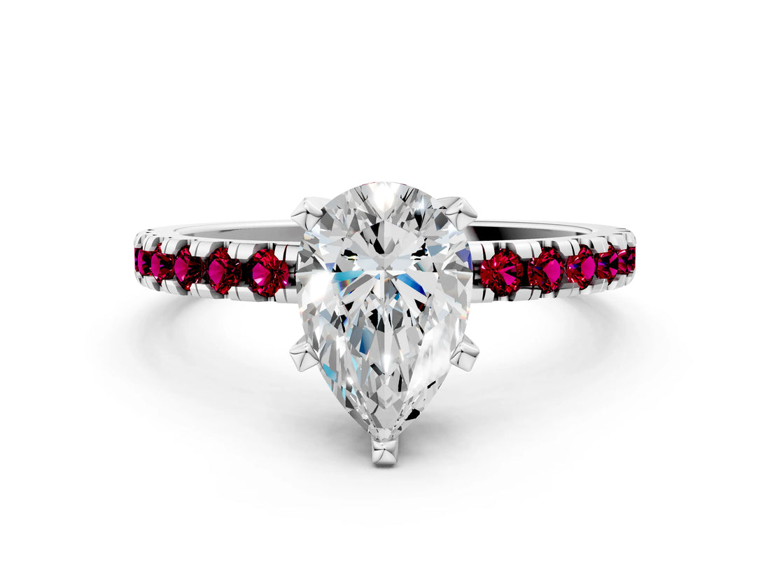 Silver Pear Cut Diamond Solitaire Ring with Round with Garnet side stone Pavé Band and Four-Prong Setting_12