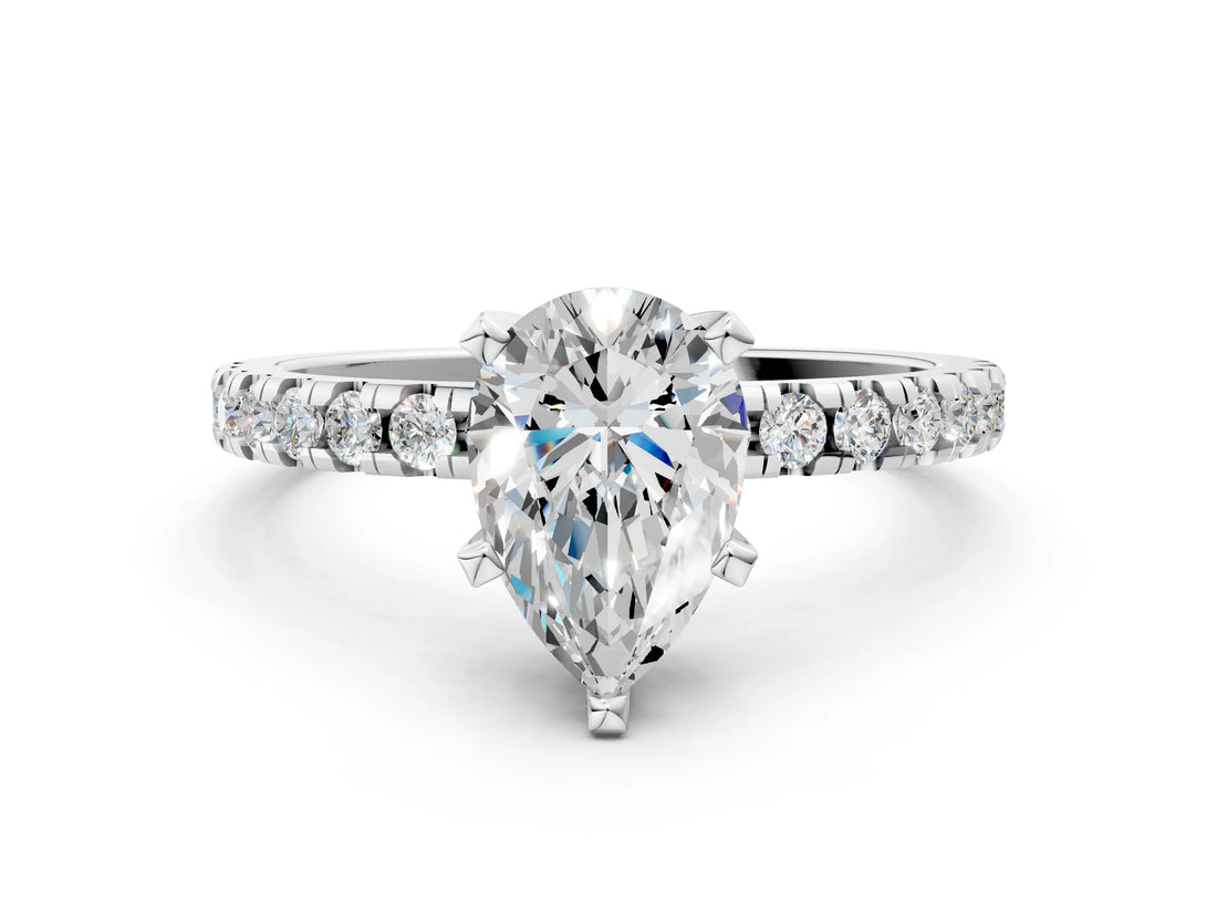 Silver Pear Cut Diamond Solitaire Ring with Round with Moissanite side stone Pavé Band and Four-Prong Setting_12