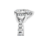 Silver Pear Cut Diamond Solitaire Ring with Round with Moissanite side stone Pavé Band and Four-Prong Setting_17