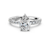 Silver Pear Cut Diamond Solitaire with Pave Band and Four-Prong Setting