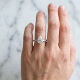 Silver Pear Cut Diamond Solitaire with Side Baguettes and Channel Set Band_96