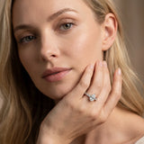 Silver Pear Cut Diamond Solitaire with Side Baguettes and Channel Set Band_97