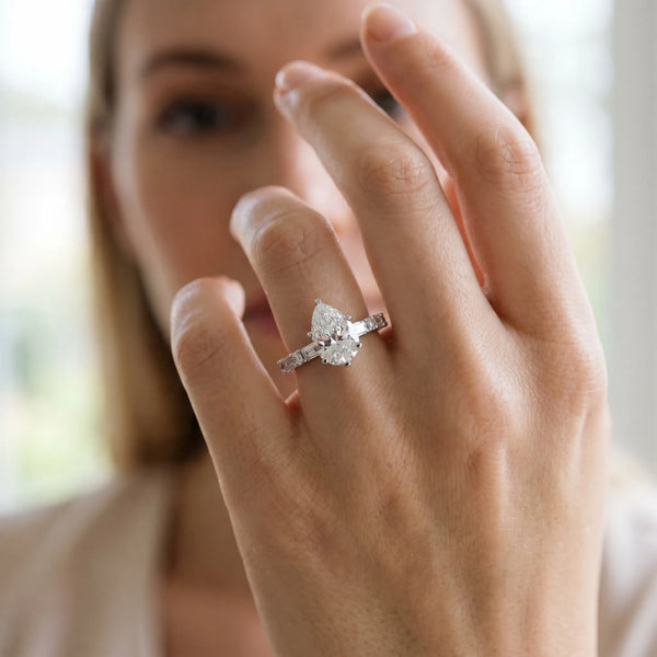 Sterling Silver Pear-Shaped Engagement Ring Setting with Baguette Side Stones and Mixed Accent Band