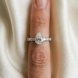 Silver Pear Cut Diamond Solitaire with Side Baguettes and Channel Set Band_99