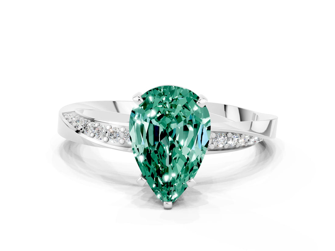 Silver Pear Cut Green Sapphire Engagement Ring with Side Stone Accents and Four-Prong Setting_12