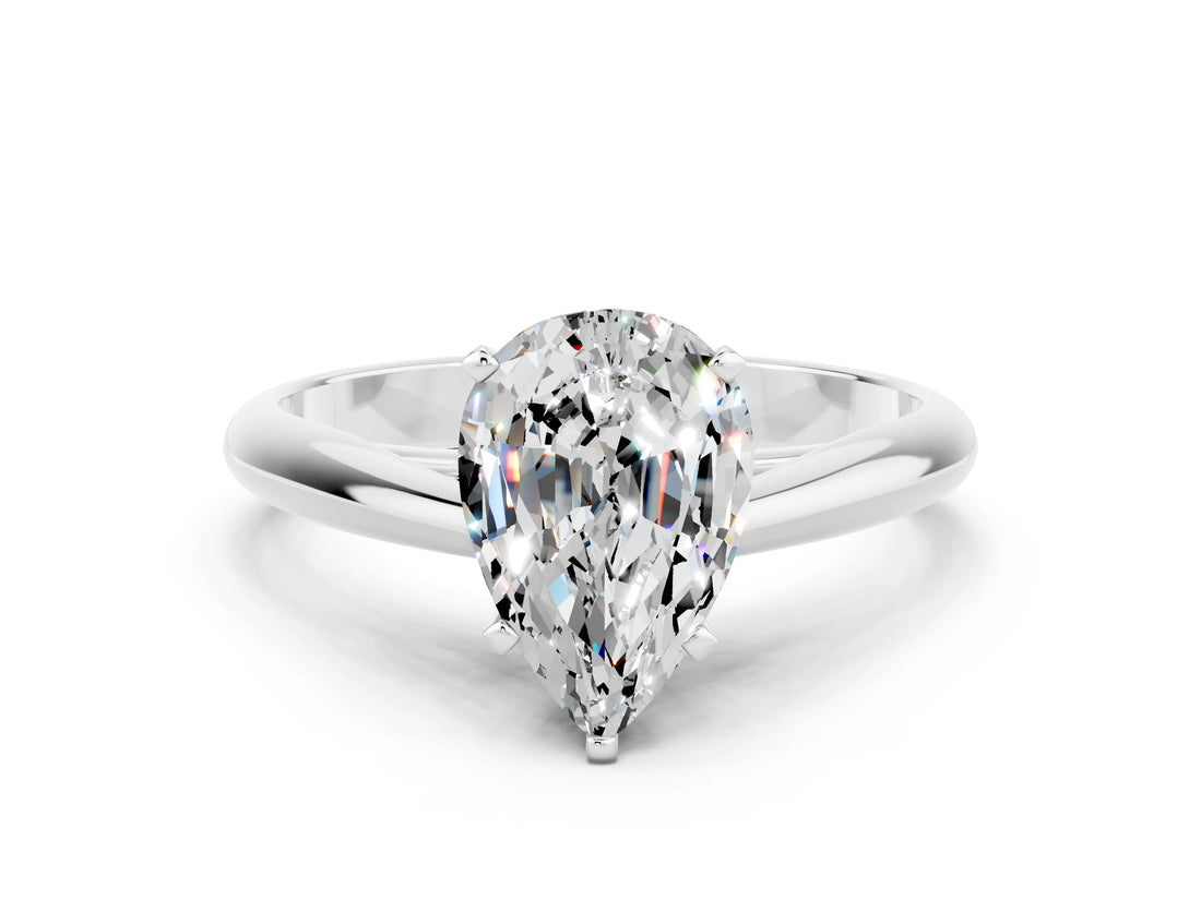 Silver Pear Cut Moissanite Solitaire Engagement Ring with Cathedral Setting and Four-Prong Mount