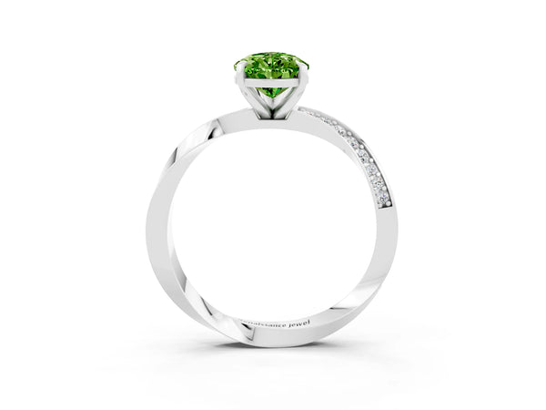 Silver Pear Cut Peridot Engagement Ring with Side Stone Accents and Four-Prong Setting