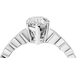 Silver Pear Cut Solitaire Diamond Ring with Infinity Twist Band and Four-Prong Setting_17