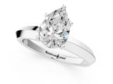 Silver Pear Cut Solitaire Engagement Ring with Flat Band and Four-Prong Setting 1
