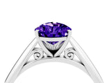 Silver Pear Cut Tanzanite Solitaire Engagement Ring with Cathedral Setting and Four-Prong Mount_4