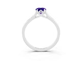 Silver Pear Cut Tanzanite Solitaire Ring with Flower Prong Setting and Classic Band_3