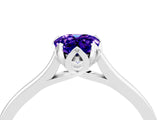 Silver Pear Cut Tanzanite Solitaire Ring with Flower Prong Setting and Classic Band_4