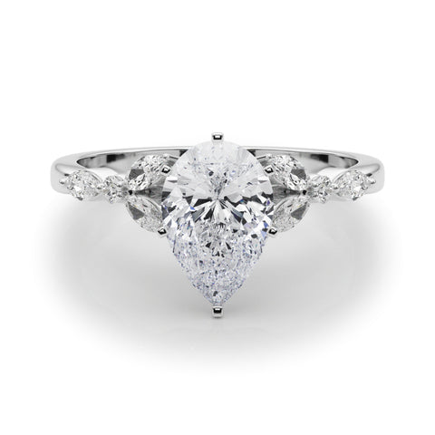 Silver Pear Diamond Solitaire with Side Stones on a Silver Band and Four-Prong Setting