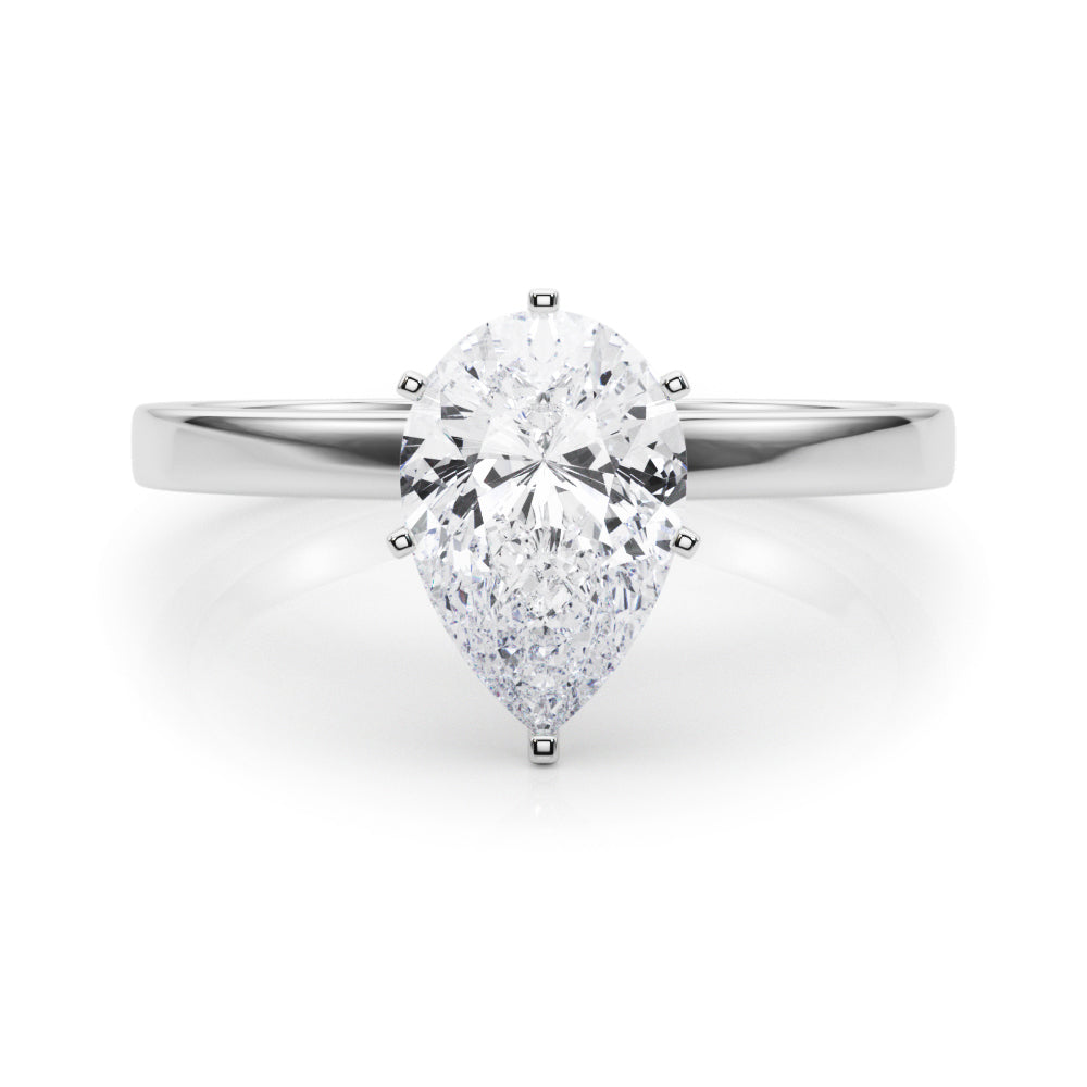 Silver Pear Solitaire Diamond Engagement Ring with Four-Prong Setting on a Classic Band