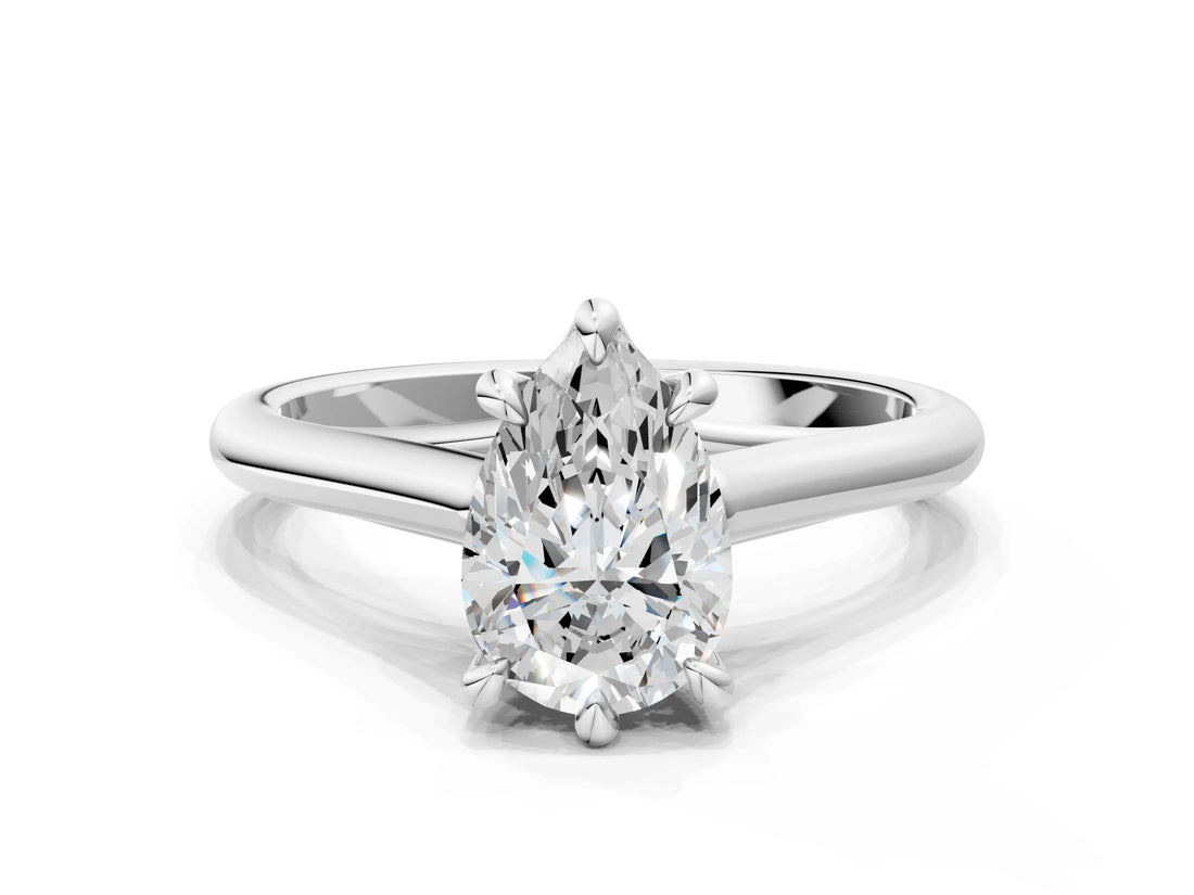 Silver Pear Solitaire Engagement Ring with Six-Prong Setting and Classic Band 1