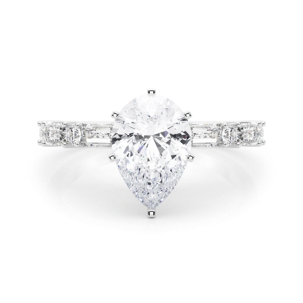 Silver Pear Solitaire with Side Baguettes and Channel Set Band