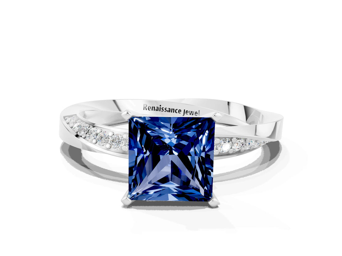 Silver Princess Cut Blue Sapphire Engagement Ring with Side Stone Accents and Four-Prong Setting_24