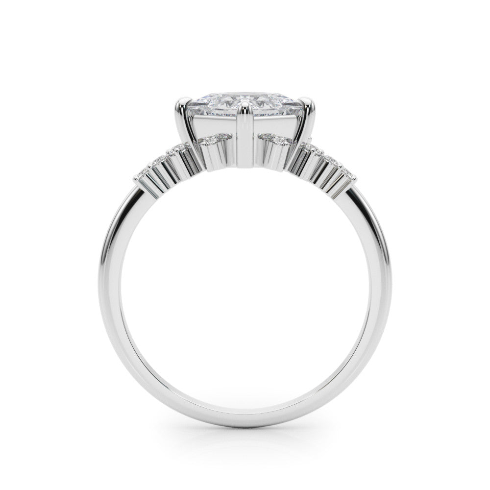 Silver Princess Cut Diamond Ring with Side Stones on a Silver Band and Four-Prong Setting