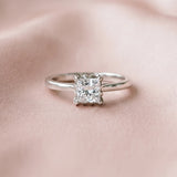 Silver Princess Cut Diamond Solitaire Ring with Flower Prong Setting and Classic Band