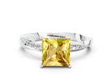 Silver Princess Cut Yellow Sapphire Engagement Ring with Side Stone Accents and Four-Prong Setting_24