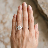 Silver Radiant Cut Diamond Ring with Marquise and Round  Side Stones and Four-Prong Setting