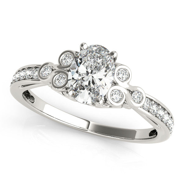 White gold Oval Diamond Bezel and Prong Setting with Pave Band