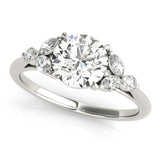 Silver Round Brilliant Cluster Diamond Ring with Marquise and Round Cut Stones on a Classic Band with Four-Prong Setting