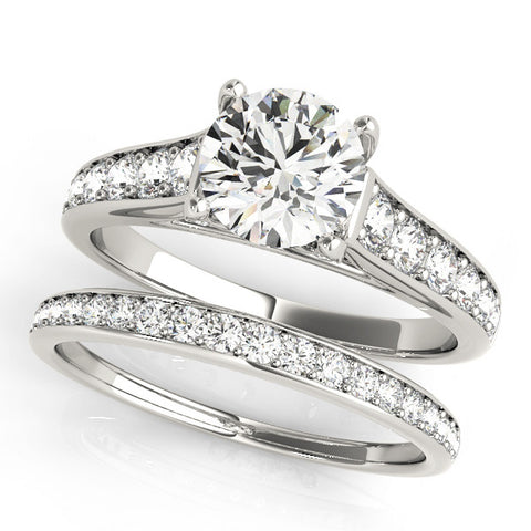 Silver Round Brilliant Cut Diamond Engagement Ring with Pavé Band and Four-Prong Setting