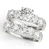 Silver Round Brilliant Diamond Five-Stone Engagement Ring with Prong Setting on a Classic Band