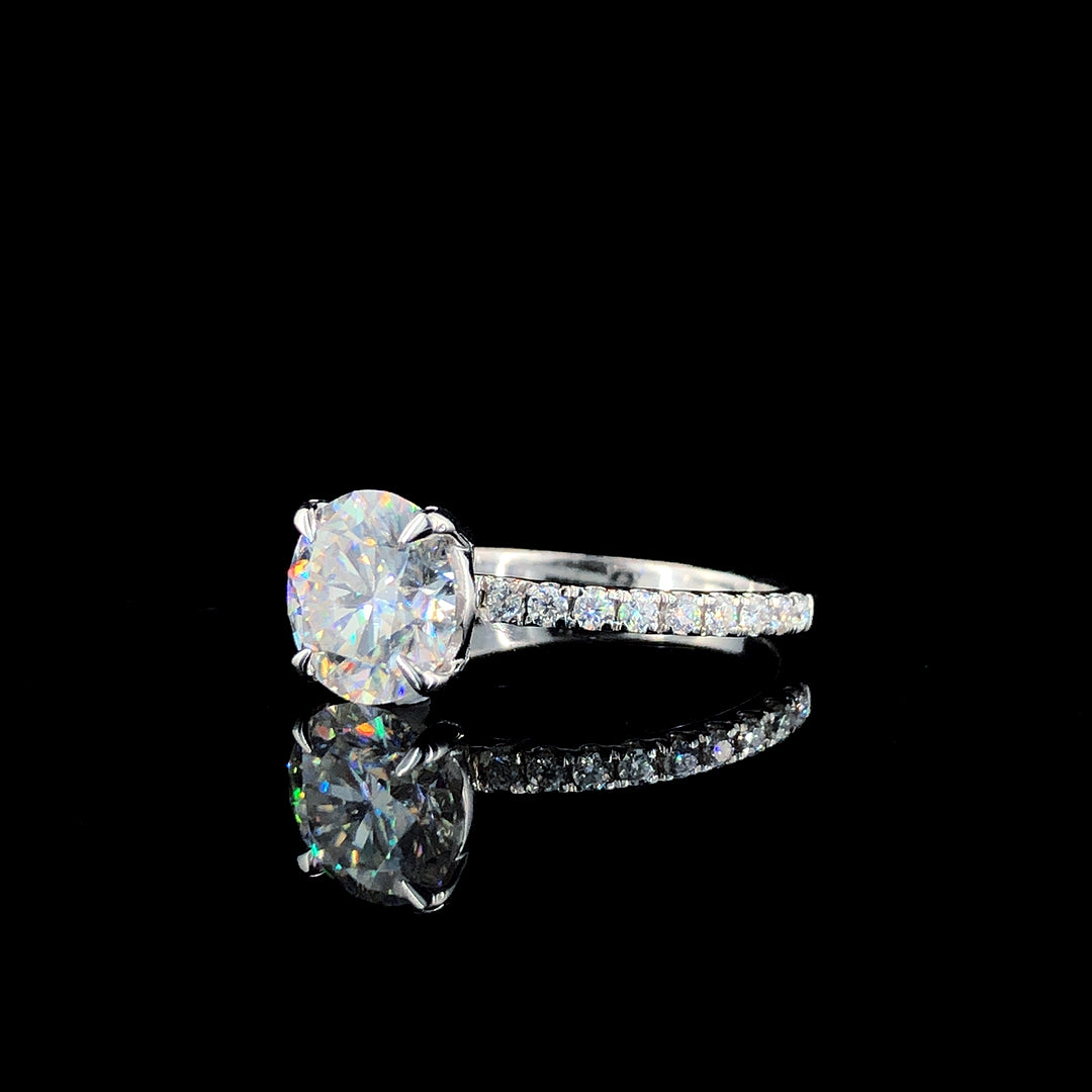 Silver Round Brilliant Solitaire with Pavé Band and Four-Prong Setting 1
