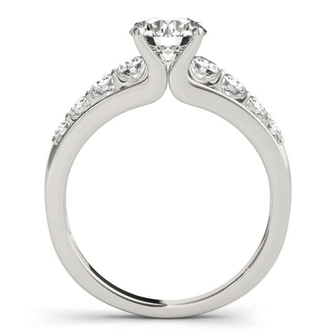 Silver Round Brilliant Solitaire with Side Stones on a Pave Band and Four-Prong Setting 1