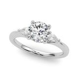 Silver Round Brilliant Three-Stone Ring with Pear Side Stones and Four-Prong Setting 1