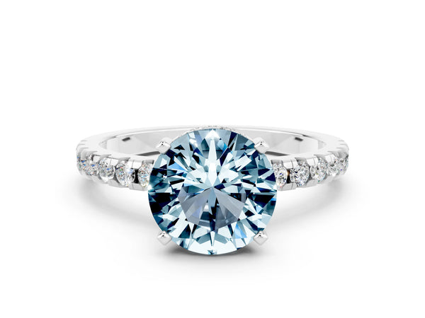 Silver Round Cut Aquamarine Solitaire Ring with Round Pavé Band and Four-Prong Setting