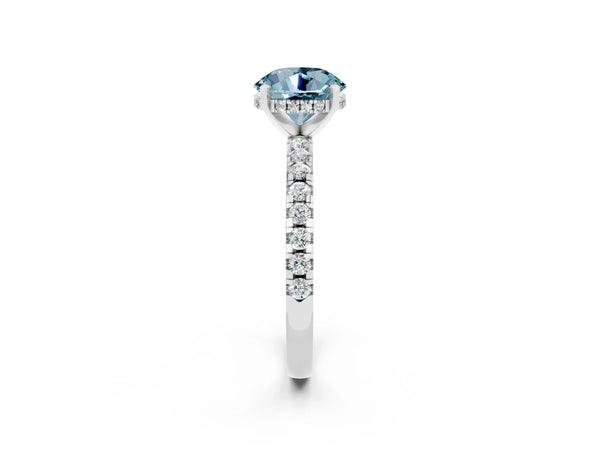 Silver Round Cut Aquamarine Solitaire Ring with Round Pavé Band and Four-Prong Setting