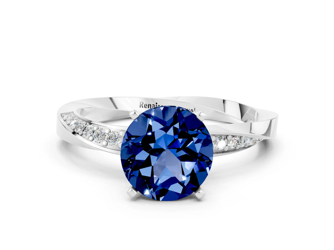 Silver Round Cut Blue Sapphire Engagement Ring with Side Stone Accents and Four-Prong Setting_12
