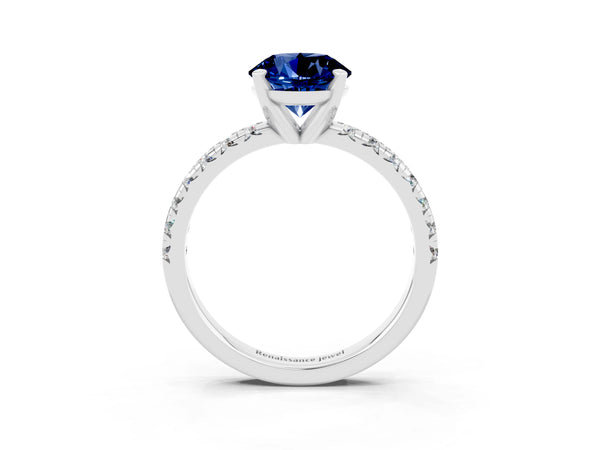 Silver Round Cut Blue Sapphire Solitaire Pavé Engagement Ring with Round Band and Prong Setting