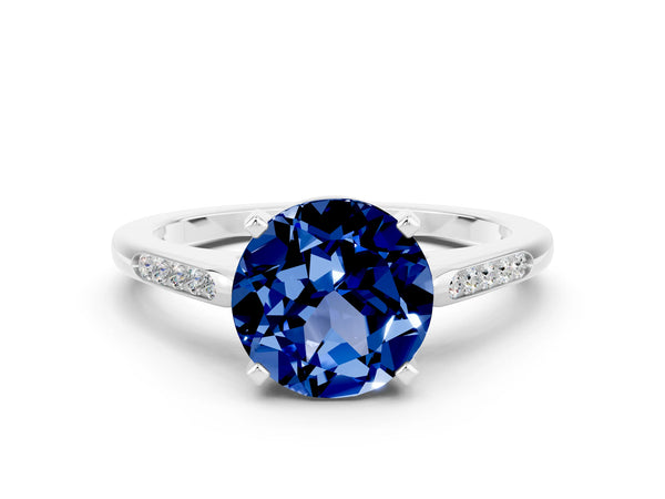 Silver Round Cut Blue Sapphire Solitaire Ring with Channel Set Round Band and Prong Setting
