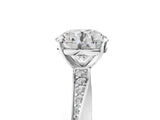 Silver Round Cut Diamond Engagement Ring with Side Stone Accents and Four-Prong Setting_25