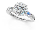 Silver Round Cut Diamond Ring with Baguette Side Stones, Channel Set Band, and Four-Prong Setting_26