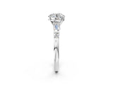 Silver Round Cut Diamond Ring with Baguette Side Stones, Channel Set Band, and Four-Prong Setting_27