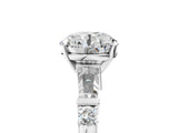Silver Round Cut Diamond Ring with Baguette Side Stones, Channel Set Band, and Four-Prong Setting_30