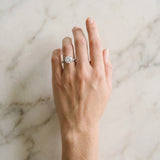 Silver Round Cut Diamond Solitaire Engagement Ring with Twisted Pavé Band and Four-Prong Setting_81