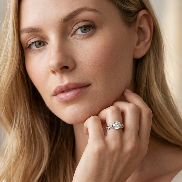 White gold Round Cut Diamond Solitaire Ring with Leaf Motif Band and Four-Prong Setting